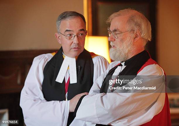 The Archbishop of Canterbury, Reverend Dr Rowan Williams and The Dean of Westminster, Reverend Dr John Hall talk in the Dean's Drawing Room before an...