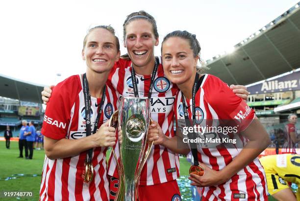 Jessica Fishlock, Rebekah Stott and Lauren Barnes of Melbourne City celebrate victory during the W-League Grand Final match between Sydney FC and...