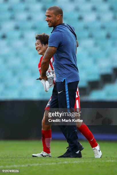 Yukari Kinga of Melbourne City and Melbourne City coach Patrick Kisnorbo celebrate victory during the W-League Grand Final match betweenSydney FC and...