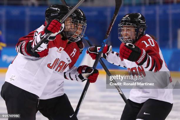 Haruna Yoneyama of Japan celebrates with teammates after a goal against Sweden in the second period during the Women's Classification game on day...