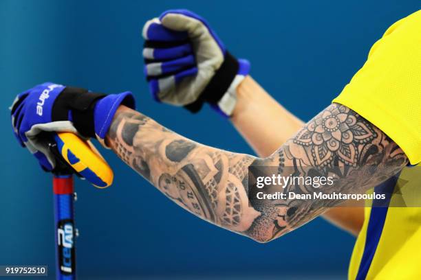 Detailed view of the tattoo on the arm of Sofia Mabergs of Sweden as she competes during the Women Curling round robin session 7 on day nine of the...