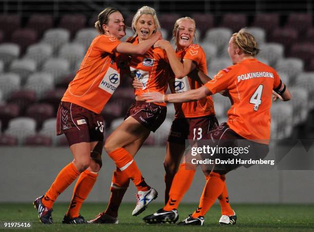 The Roar celebrates the goal of Sasha McDonnell during the round three W-League match between the Brisbane Roar and the Central Coast Mariners at...