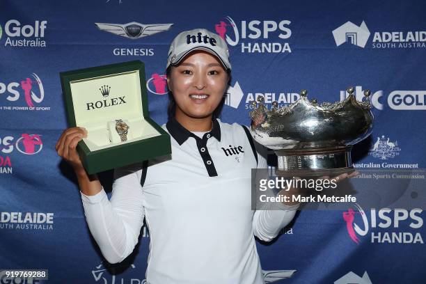 Jin Young Ko of South Korea poses with a Rolex watch and the winner's trophy after winning the Women's Australian Open during day four of the ISPS...