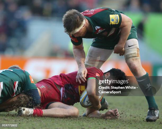 Harlequins' Alofa Alofa is tackled by Leicester Tigers' Mathew Tait and Brendon O'Connor during the Aviva Premiership match between Leicester Tigers...