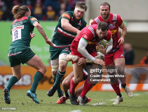 Harlequins' Tim Visser is tackled by Leicester Tigers' Adam Thompstone during the Aviva Premiership match between Leicester Tigers and Harlequins at...