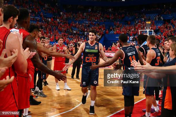 Stephen Weigh of the Taipans walks thru a guard of honour after retiring from the game following the round 19 NBL match between the Perth Wildcats...