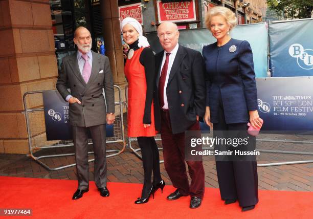 Prince Michael of Kent and Princess Michael of Kent pose with Director Julian Fellowes and wife Emma Kitchener-Fellowes at the arrivals for the...