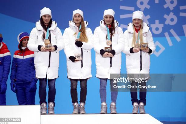 Bronze medalists Natalia Nepryaeva, Yulia Belorukova, Anastasia Sedova and Anna Nechaevskaya of Olympic Athlete from Russia celebrate during the...