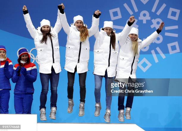 Bronze medalists Natalia Nepryaeva, Yulia Belorukova, Anastasia Sedova and Anna Nechaevskaya of Olympic Athlete from Russia celebrate during the...