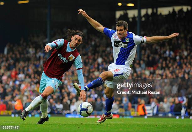 Chris Eagles of Burnley battles with Ryan Nelsen of Blackburn during the Barclays Premier League match between Blackburn Rovers and Burnley at Ewood...