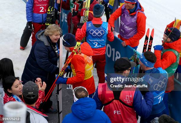 Prime Minister of Norway Erna Solberg congratulates gold medalists of Team Norway Didrik Toenseth, Martin Johnsrud Sundby, Simen Hegstad Krueger,...