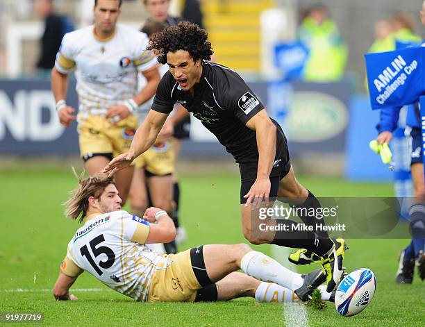 Tane Tu'ipulotu of Newcastle is tackled by Benjamin Lapeyre of Albi during the Amlin Challenge Cup match between Newcastle Falcons and Albi at...