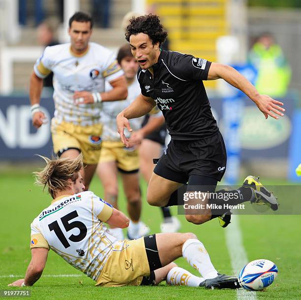 Tane Tu'ipulotu of Newcastle is tackled by Benjamin Lapeyre of Albi during the Amlin Challenge Cup match between Newcastle Falcons and Albi at...