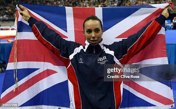 Beth Tweddle of Great Britain celebrates after she won gold in the floor exercise during the Apparatus Finals on the sixth day of the Artistic...