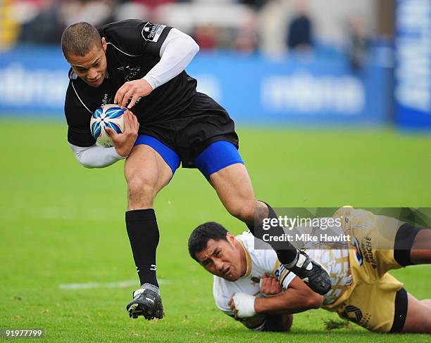 Danny Williams breaks a tackle on his way to scoring his team's first try during the Amlin Challenge Cup match between Newcastle Falcons and Albi at...