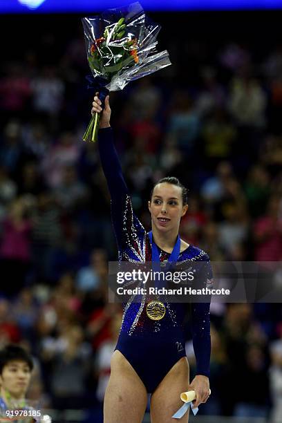 Beth Tweddle of Great Britain celebrates with her gold medal after she won the floor exercise during the Apparatus Finals on the sixth day of the...