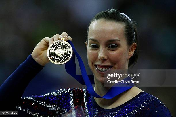 Beth Tweddle of Great Britain celebrates with her gold medal after she won the floor exercise during the Apparatus Finals on the sixth day of the...