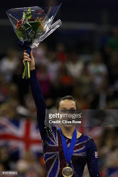 Beth Tweddle of Great Britain celebrates with her gold medal after she won the floor exercise during the Apparatus Finals on the sixth day of the...