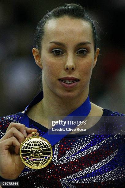 Beth Tweddle of Great Britain celebrates with her gold medal after she won the floor exercise during the Apparatus Finals on the sixth day of the...