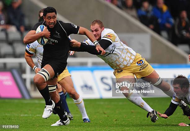 Josh Afu of Newcastle bursts through the Albi defence during the Amlin Challenge Cup match between Newcastle Falcons and Albi at Kingston Park on...