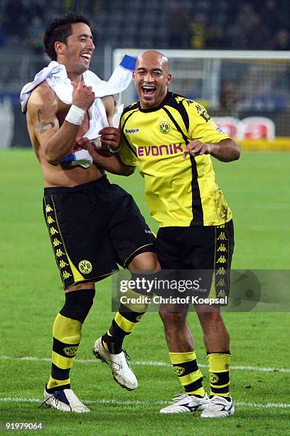 Lucas Barrios and Dede of Dortmund celebrates the 2-0 victory after the Bundesliga match between Borussia Dortmund and VfL Bochum at the Signal Iduna...