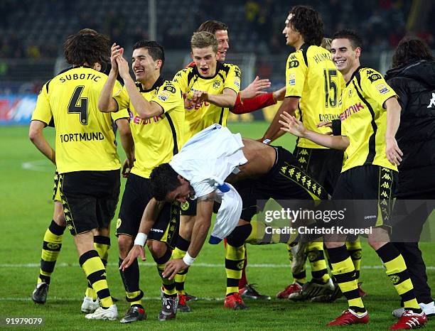 Neven Subotic, Nuri Sahin, Kevin Grosskreutz, Lucas Barrios, Mats Hummels and Damien Le Tallec of Dormtund celebrates the 2-0 victory after the...