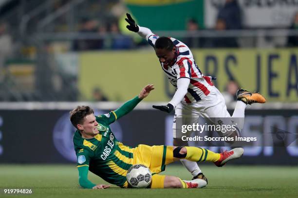 Danny Bakker of ADO Den Haag, Eyong Enoh of Willem II during the Dutch Eredivisie match between ADO Den Haag v Willem II at the Cars Jeans Stadium on...