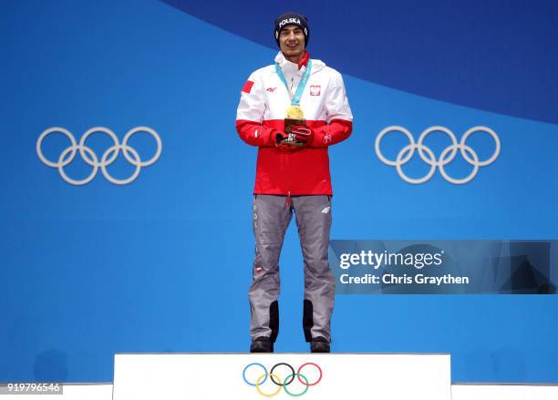 Gold medalist Kamil Stoch of Poland celebrates during the medal ceremony for the Ski Jumping - Men's Large Hill on day nine of the PyeongChang 2018...
