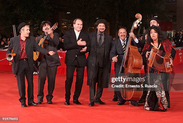 Actors Aleksei Guskov and Radu Mihaileanu attend 'The Concert' Premiere during day 4 of the 4th Rome International Film Festival held at the...