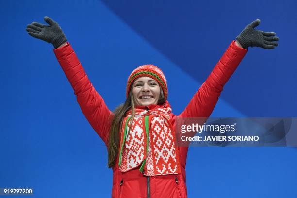 Belarus' silver medallist Darya Domracheva poses on the podium during the medal ceremony for the biathlon women's 12,5km mass start at the...