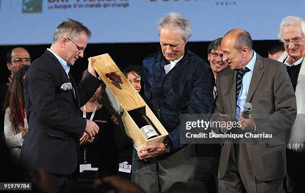 Actor Clint Eastwood receives from the Mayor of Lyon Gerard Collomb a "Jeroboam" of Famous French Wine "Cote Rotie" before the presentation of his...