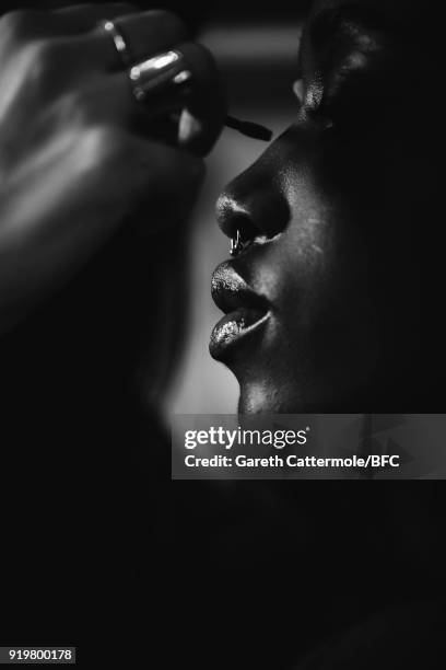 Model backstage ahead of the Jasper Conran show during London Fashion Week February 2018 at Claridges Hotel on February 17, 2018 in London, England.