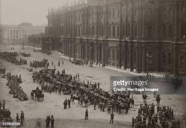 Regiments summoned back from the war front by the Provisional Government on Palace Square, before the Winter Palace, 1917. Found in the collection of...