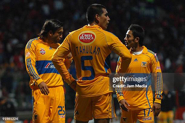 Tigres' Francisco Fonseca , Jose Alfredo Tahuilan and David Toledo during their match in the 2009 Opening tournament, as part of the Mexican Football...