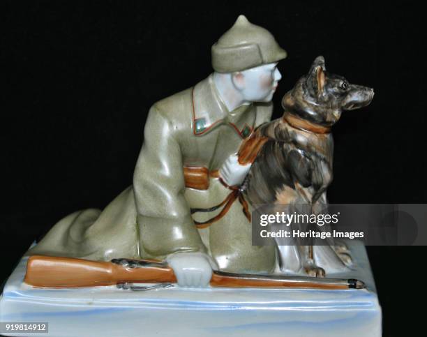 Soviet border guard with his dog, End 1930s. Private Collection.