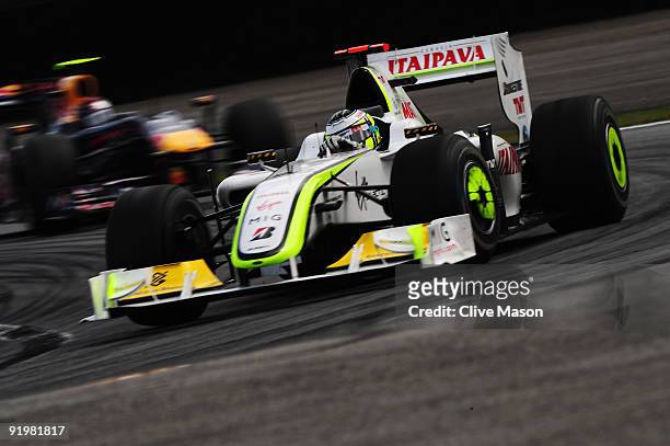 Jenson Button of Great Britain and Brawn GP drives on his way clinching the F1 World Drivers Championship during the Brazilian Formula One Grand Prix...