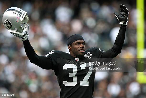 Chris Johnson of the Oakland Raiders celebrates near the end of the game against the Philadelphia Eagles during an NFL game at the Oakland-Alameda...
