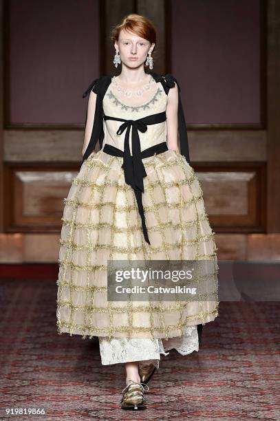 Model walks the runway at the Simone Rocha Autumn Winter 2018 fashion show during London Fashion Week on February 17, 2018 in London, United Kingdom.