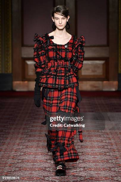 Model walks the runway at the Simone Rocha Autumn Winter 2018 fashion show during London Fashion Week on February 17, 2018 in London, United Kingdom.