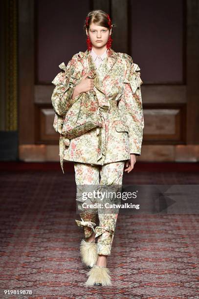 Model walks the runway at the Simone Rocha Autumn Winter 2018 fashion show during London Fashion Week on February 17, 2018 in London, United Kingdom.