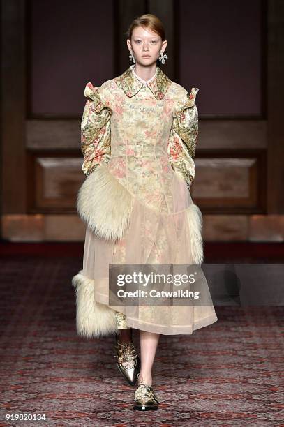 Model walks the runway at the Simone Rocha Autumn Winter 2018 fashion show during London Fashion Week on February 17, 2018 in London, United Kingdom.