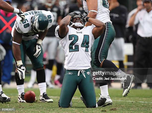 Sheldon Brown of the Philadelphia Eagles reacts after missing an interception against the Oakland Raiders during an NFL game at the Oakland-Alameda...