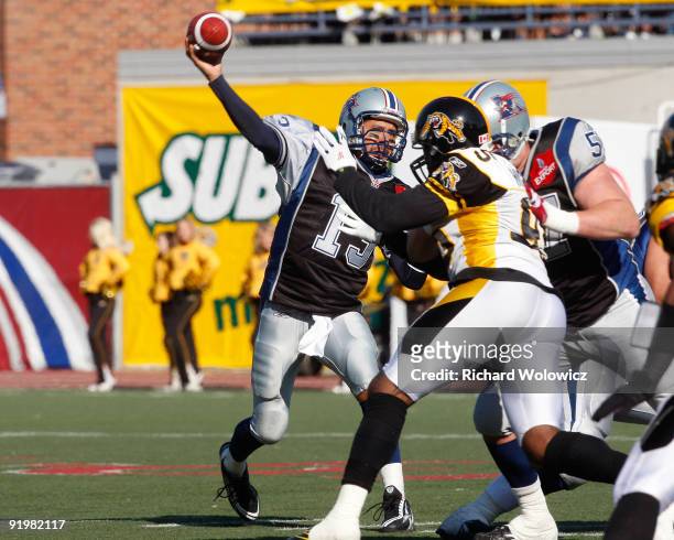 Anthony Calvillo of the Montreal Alouettes throws the ball during the CFL game against the Hamilton Tigre-Cats at Percival Molson Stadium on October...