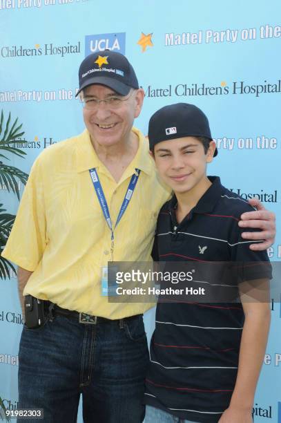 Jake Austin and Dr. Edward McCabe arrive at the Mattel Party On The Pier on October 18, 2009 in Santa Monica, California.