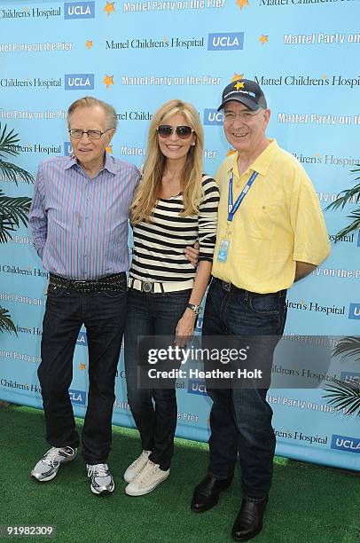 Larry King, Shawn King, and Dr. Edward McCabe arrive at the Mattel Party On The Pier on October 18, 2009 in Santa Monica, California.