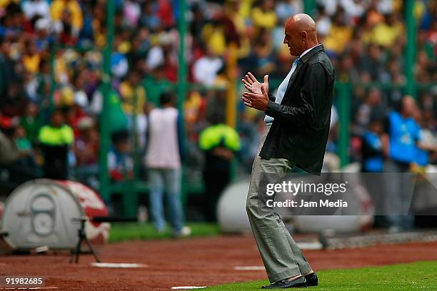 Puebla's head coach Jose Luis Sanchez reacts during their match in the 2009 Opening tournament, the closing stage of the Mexican Football League, at...