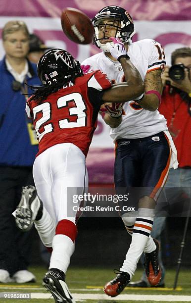 Center back Chris Houston of the Atlanta Falcons breaks up a pass tended for wide receiver Johnny Knox of the Chicago Bears in the second quarter of...