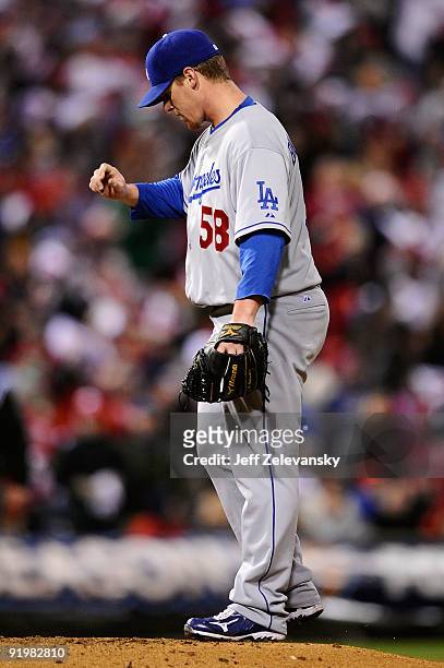 Chad Billingsley of the Los Angeles Dodgers reacts to giving up an RBI single to Carlos Ruiz of the Philadelphia Phillies in Game Three of the NLCS...