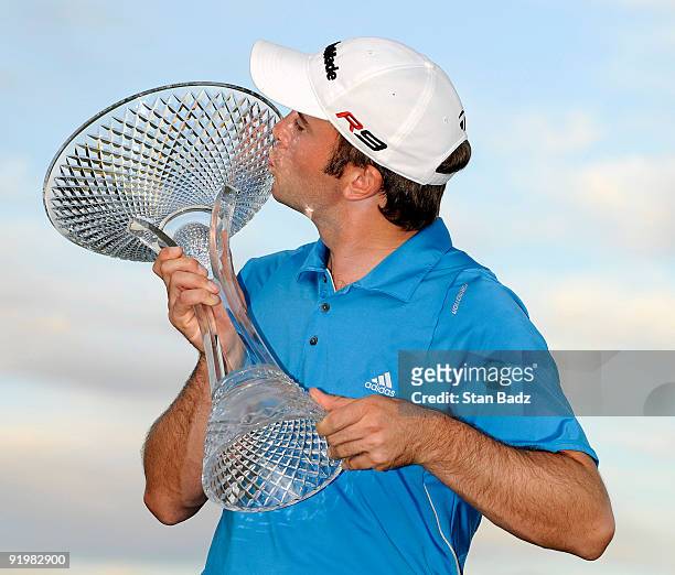Martin Laird kisses the winner's trophy on the 18th green following a three man play-off during the final round of the Justin Timberlake Shriners...