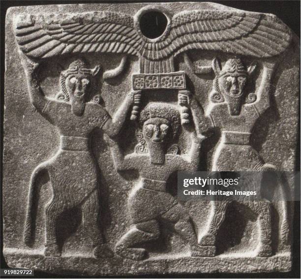 Orthostates depicting Gilgamesh between two minotaur demigods holding up the sun disc. From Tell Halaf, Syria, 9th century BC. Found in the...